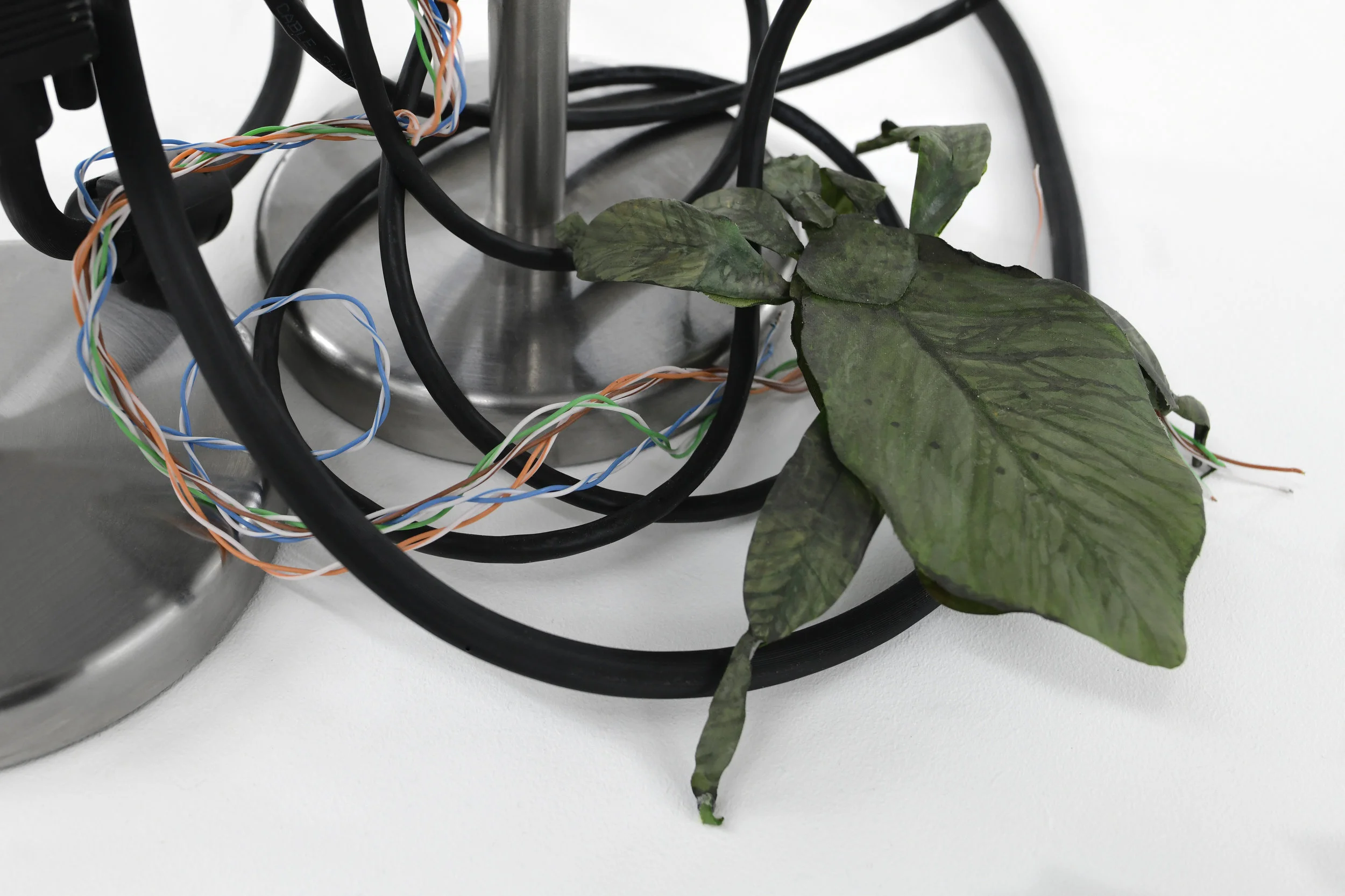 Michele Gabriele, It’s always so hard to admit that things are different than what we had believed at first sight , Paint, epoxy clay, steel, cables, digital print, glass, rubber, 2019, detail