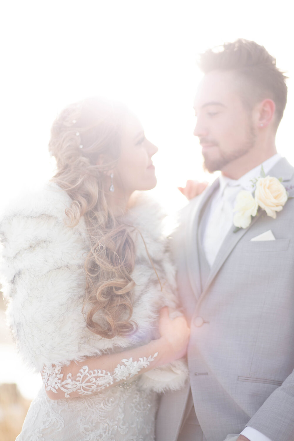 A subtle light leak during bride and groom wedding portraits