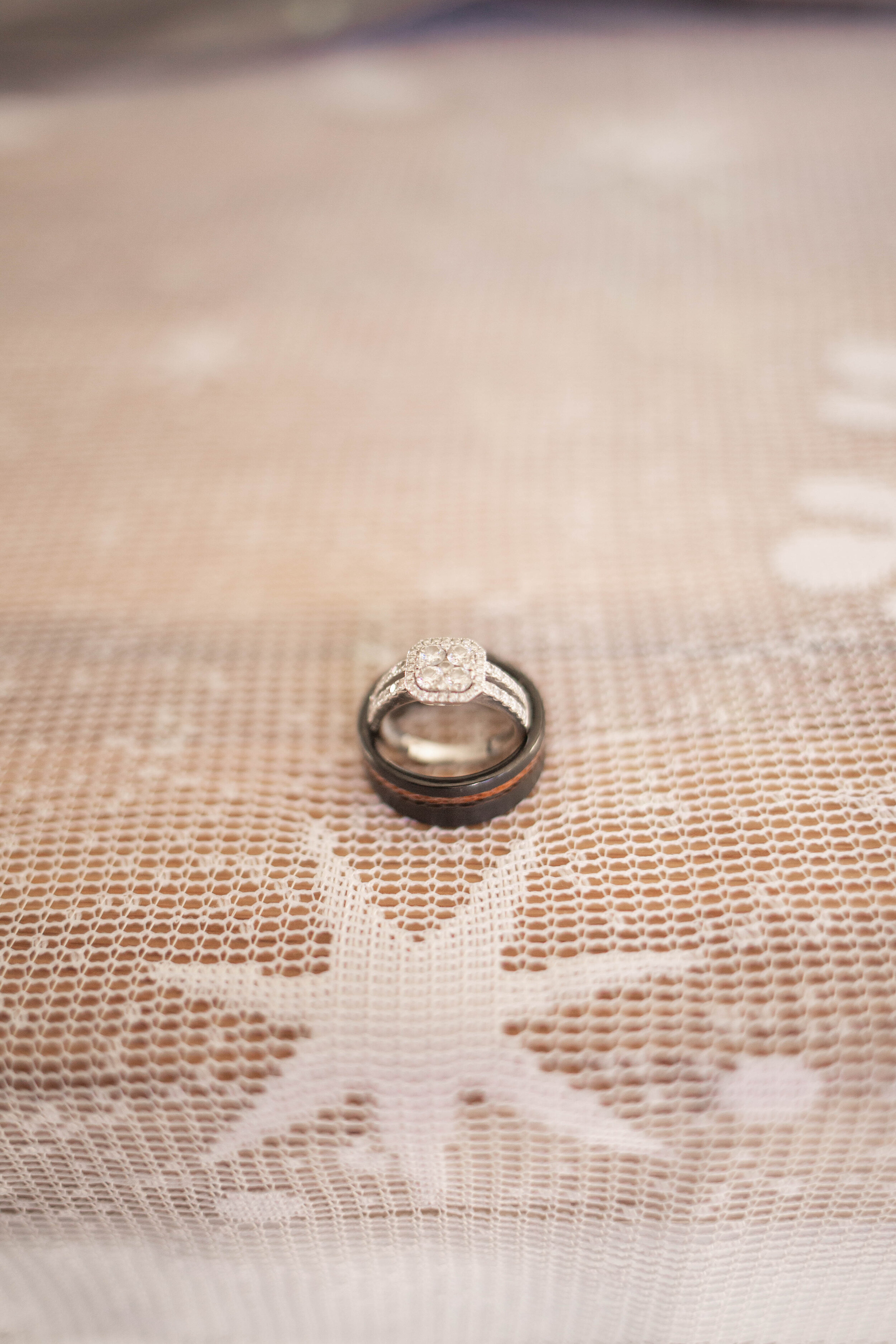 Winter wedding details with his and hers wedding rings 
