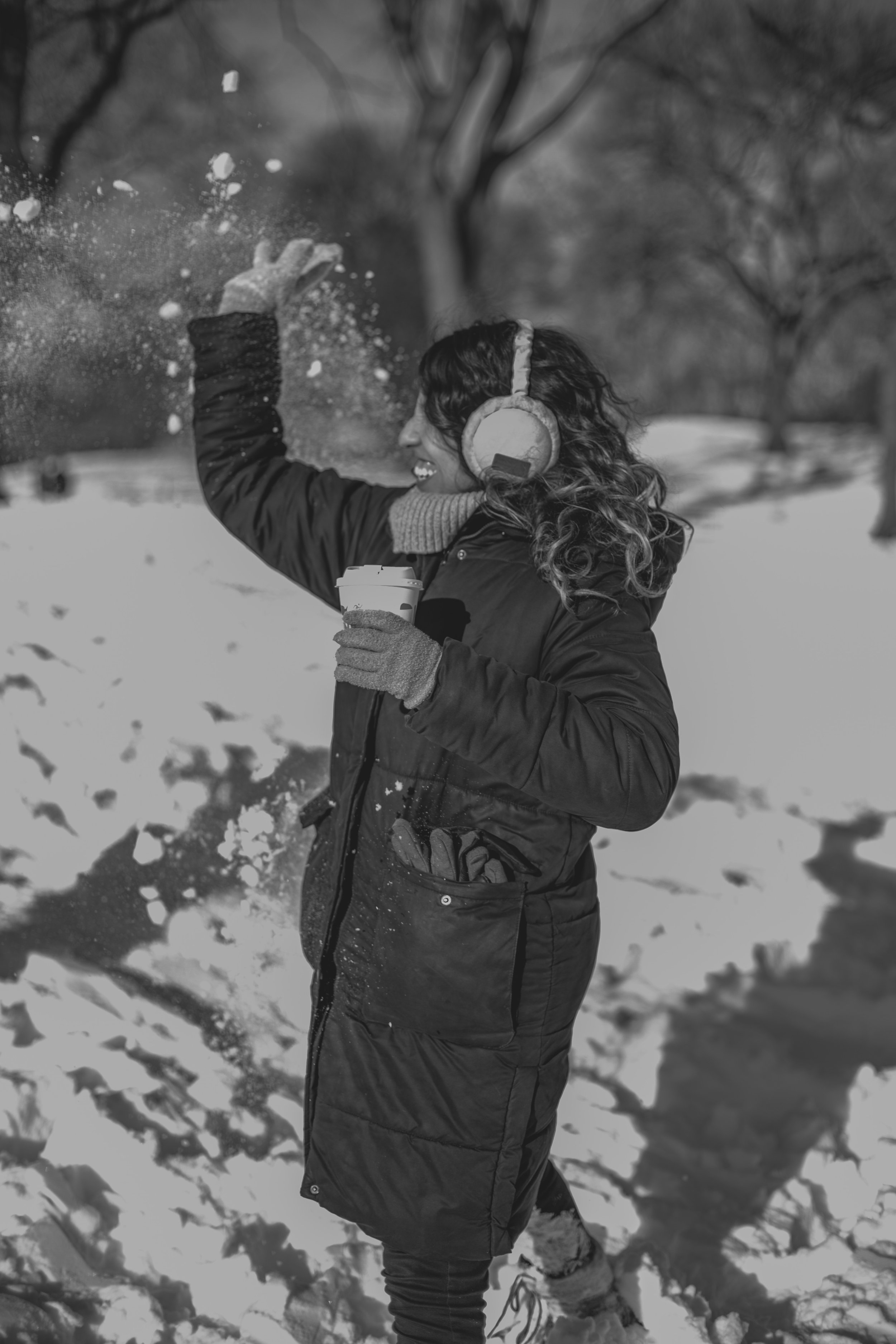 Black and white throwing snow in central park