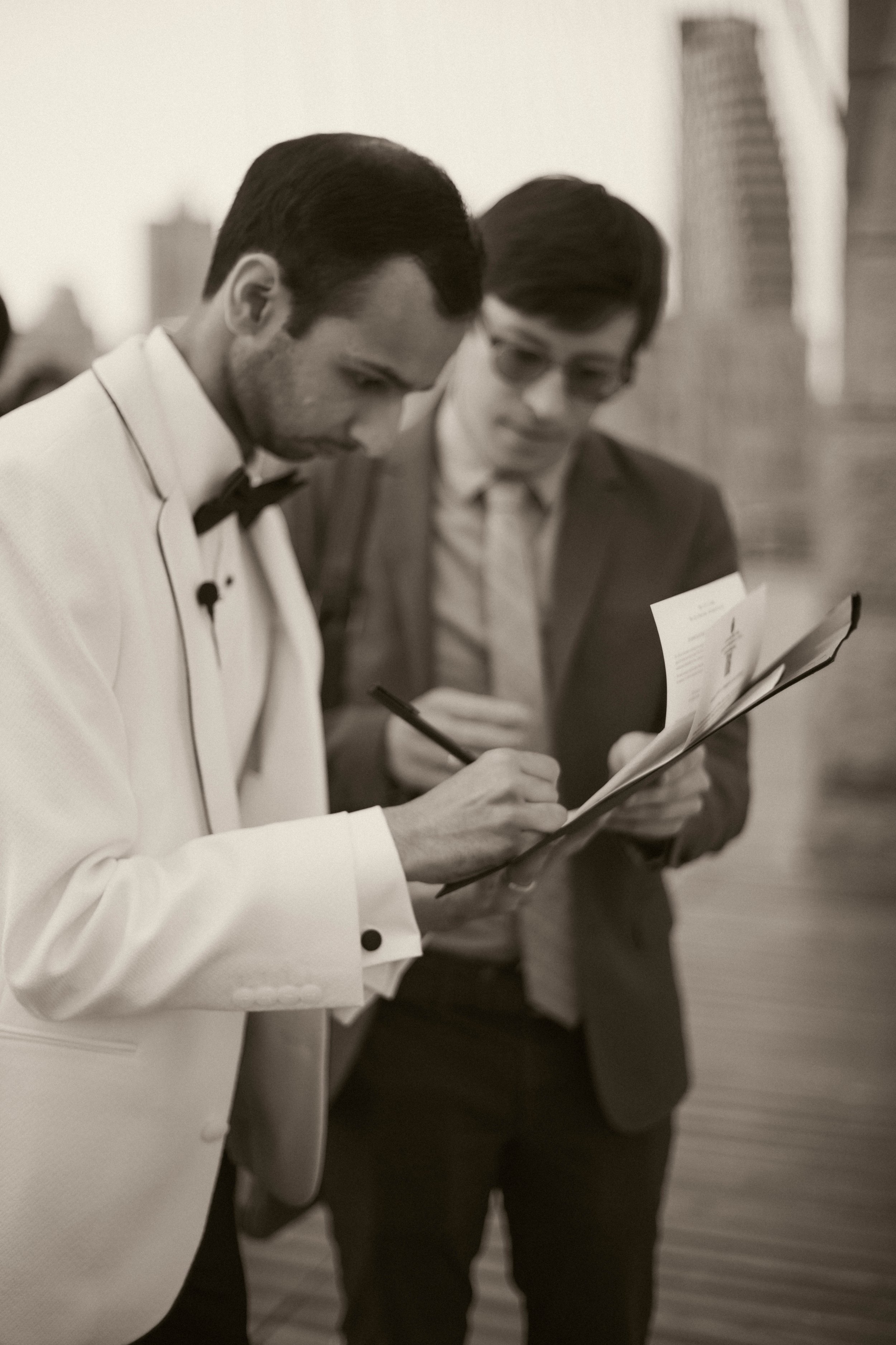 Make your NYC elopement unforgettable with our tailored package, including a photographer and officiant who specialize in capturing the essence of the city while curating your unique love story.