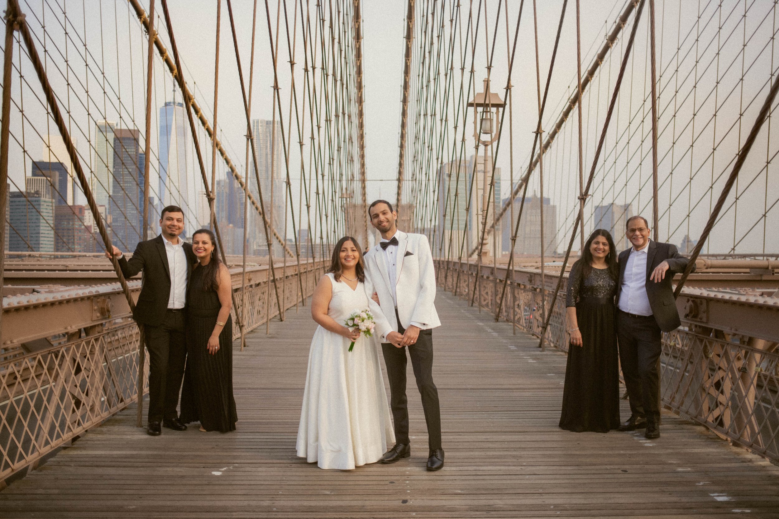 non-traditional family poses for a small new york city elopement