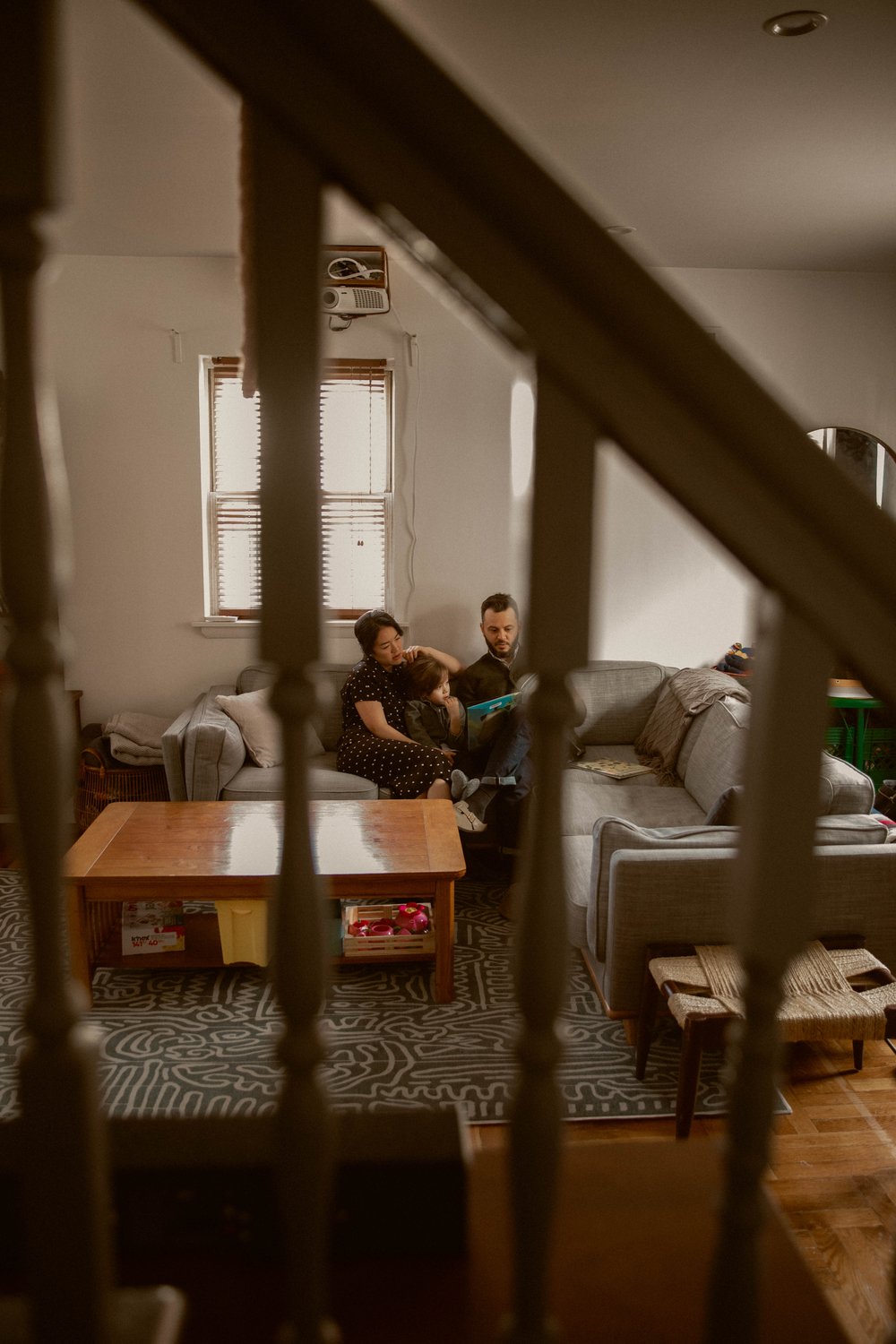 A shot through the stairs during a cinematic documentary style photoshoot in Brooklyn, NY