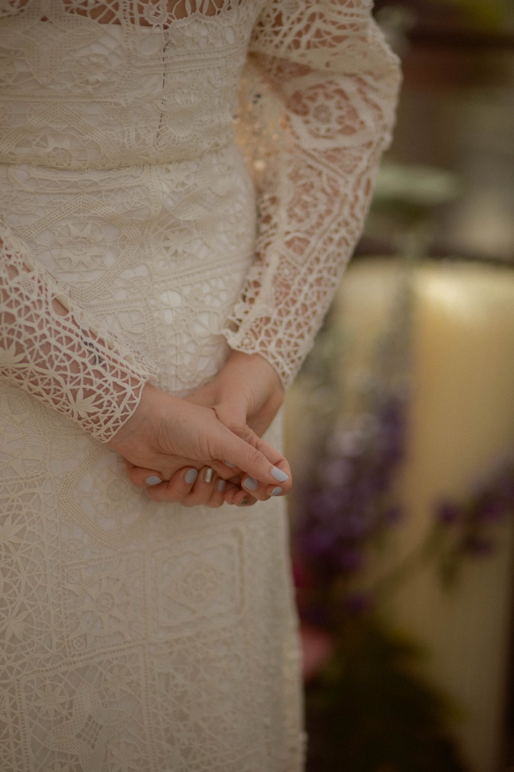 how the  bride held her hands during the ceremony