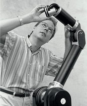 Barrett founder Bill Townsend inspecting a WAM Arm in 1997