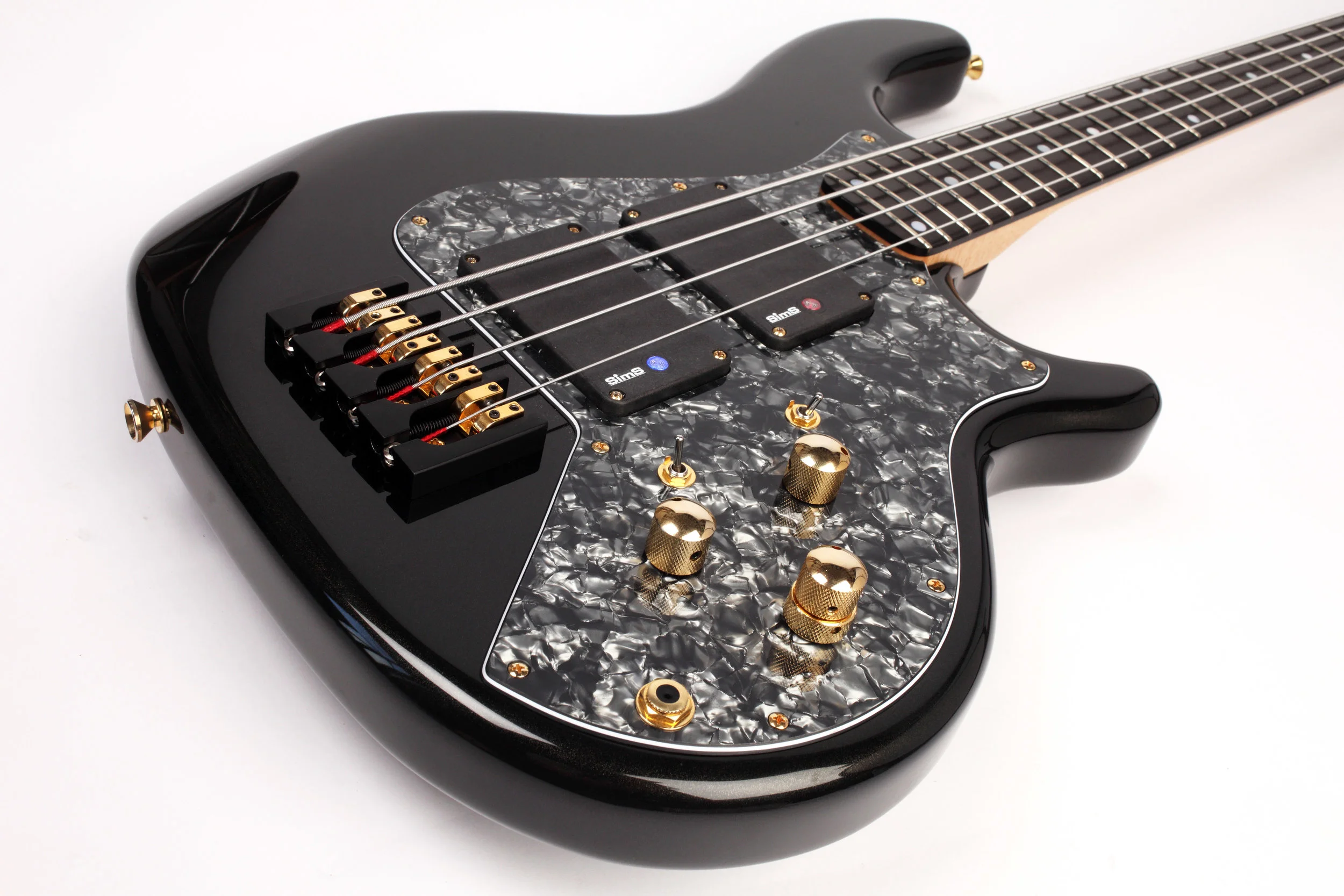 Black gold pearl high gloss polish Enfield Lionheart bass guitar with 2 band Glockenklang onboard preamp, Sims Super-Quad pickups and Hipshot hardware bridge.