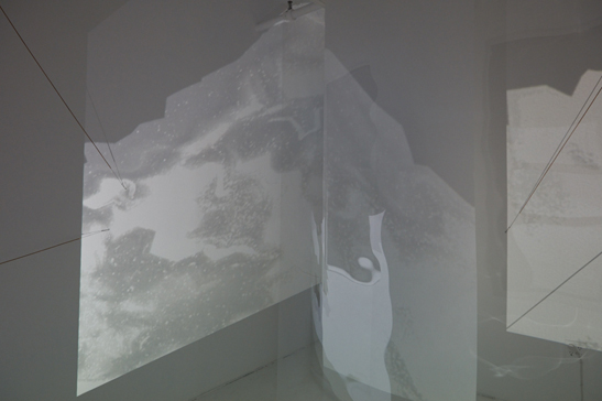   Soon enough roads will be rivers , 2017 (detail). 2-channel video, piano strings, custom software, electronics, architectural vellum screens, acetate film screens, 3D printed porcelain. Dimensions variable. 