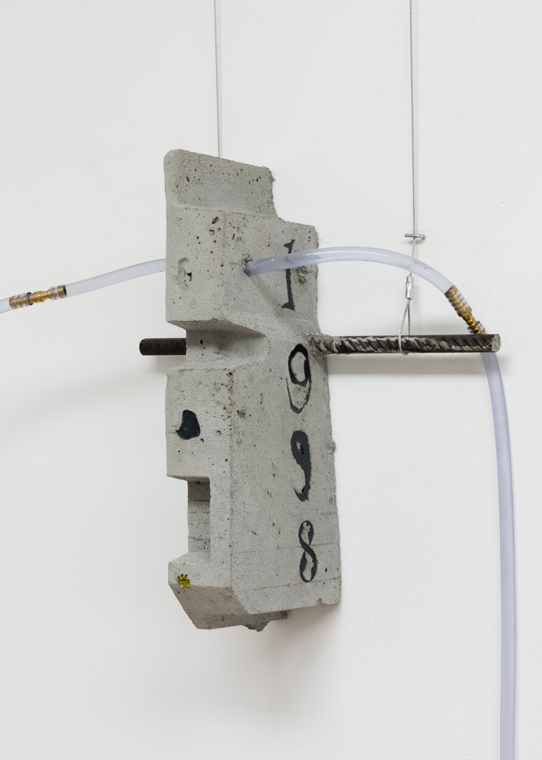  Phoebe Berglund in collaboration with Arkadiy Ryabin,  1998,  2019. Concrete, rebar, plexiglass, vinyl tubing. 14 x 12 x 5.5 inches. 