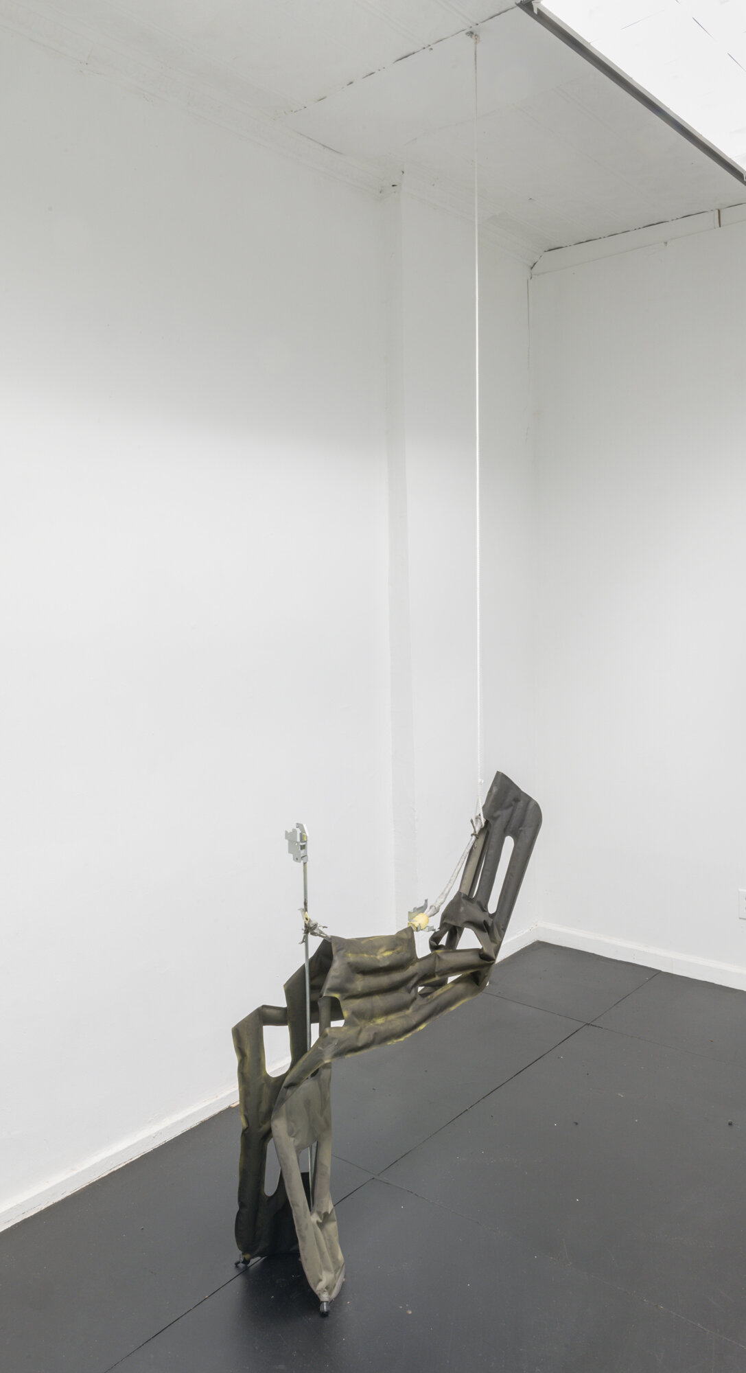  Bryce Kroll,  Suspended inflatable, curvilinear tube, vertical rod,  2021. Inflatable sleeping mat, plastic, threaded rod, aluminum hardware, rope, silicone. 43 x 39 x 10 inches. 