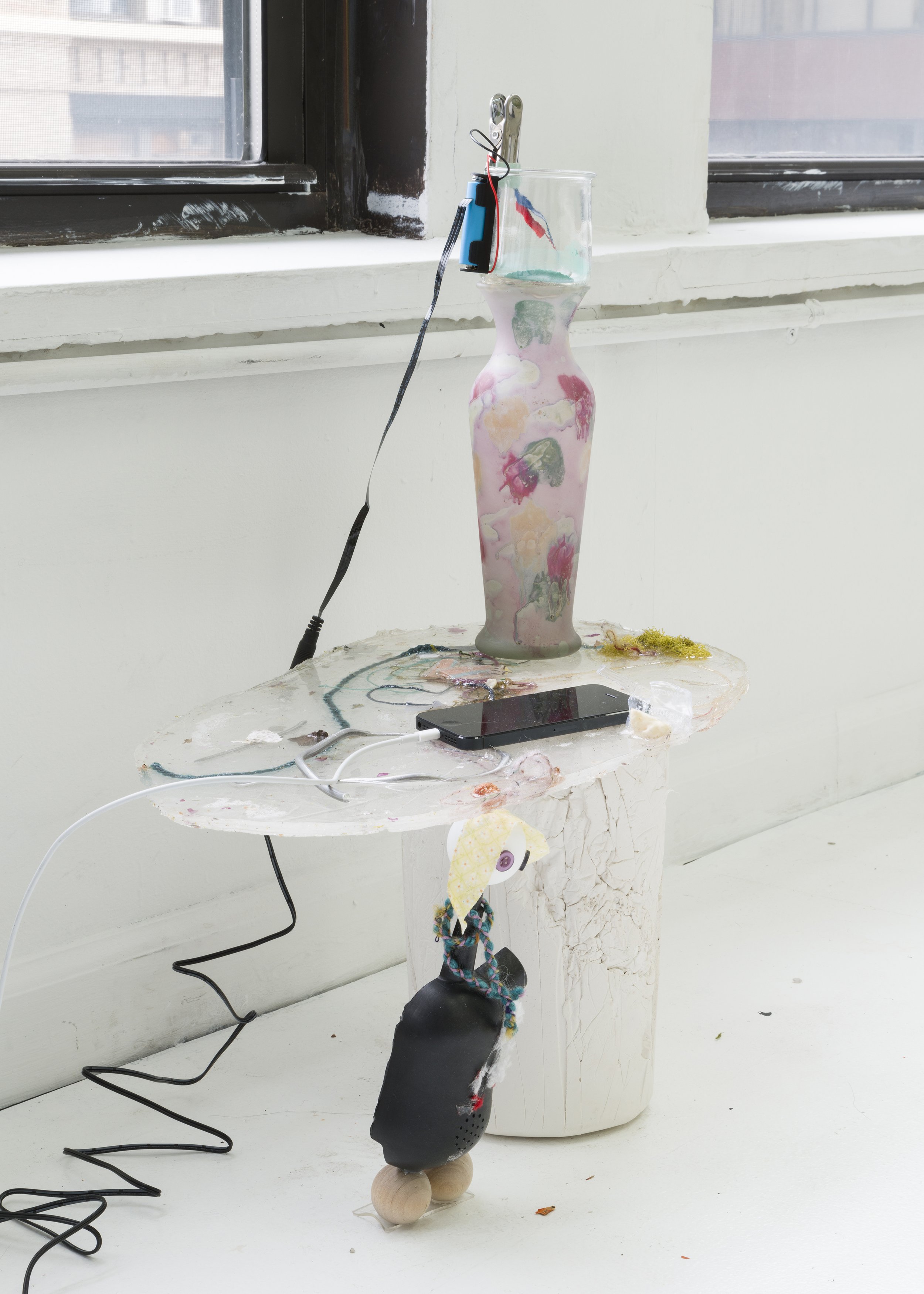   Cricket Tower,  2022. Resin, studio debris, found objects, yarn, plaster, clip, vibrating motor, mica pigment. 22 x 18 x 10 inches. 