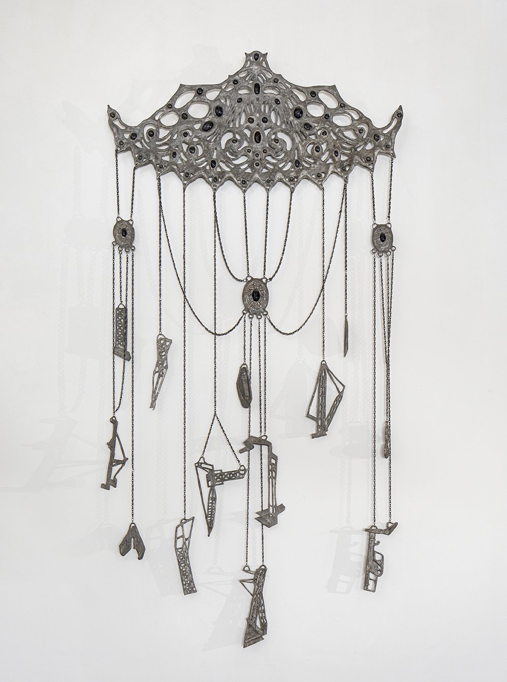  Marsha Pels,  Chatelaine of Eviction , 2013-2015. Patined cast aluminum, flame-worked glass, pewter chains. 120 x 60 x 2 inches. 