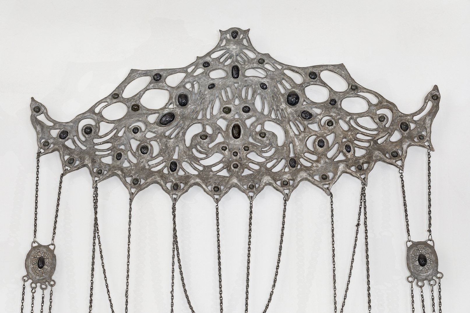  Marsha Pels,  Chatelaine of Eviction  (detail), 2013-2015. Patined cast aluminum, flame-worked glass, pewter chains. 120 x 60 x 2 inches. 