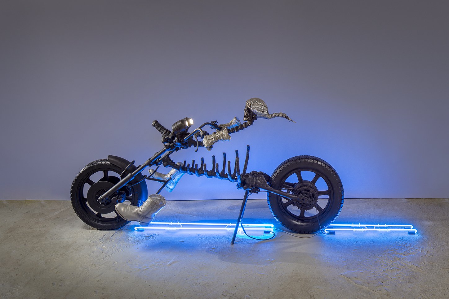  Marsha Pels,  Dead Cowboy  (detail), 2007-2008. Cast epoxy resin, cast rubber, deconstructed motorcycle, steel, neon lights, argon- mercury text on wall. 48 x 120.5 x 36 inches. 