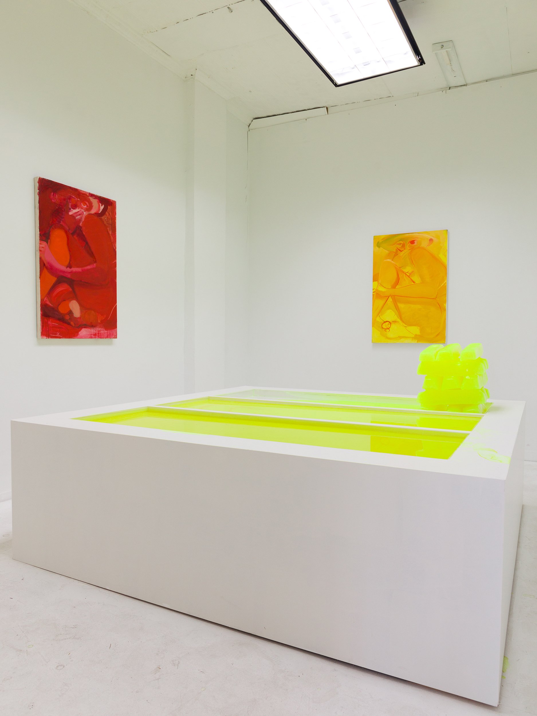  David Muenzer,  Highlighter Ingots  (interval 3 of 3) ,  2015–16. Highlighter ink, wood, latex paint, plexiglas. 22.25 x 71 x 74.25 in (melted). 