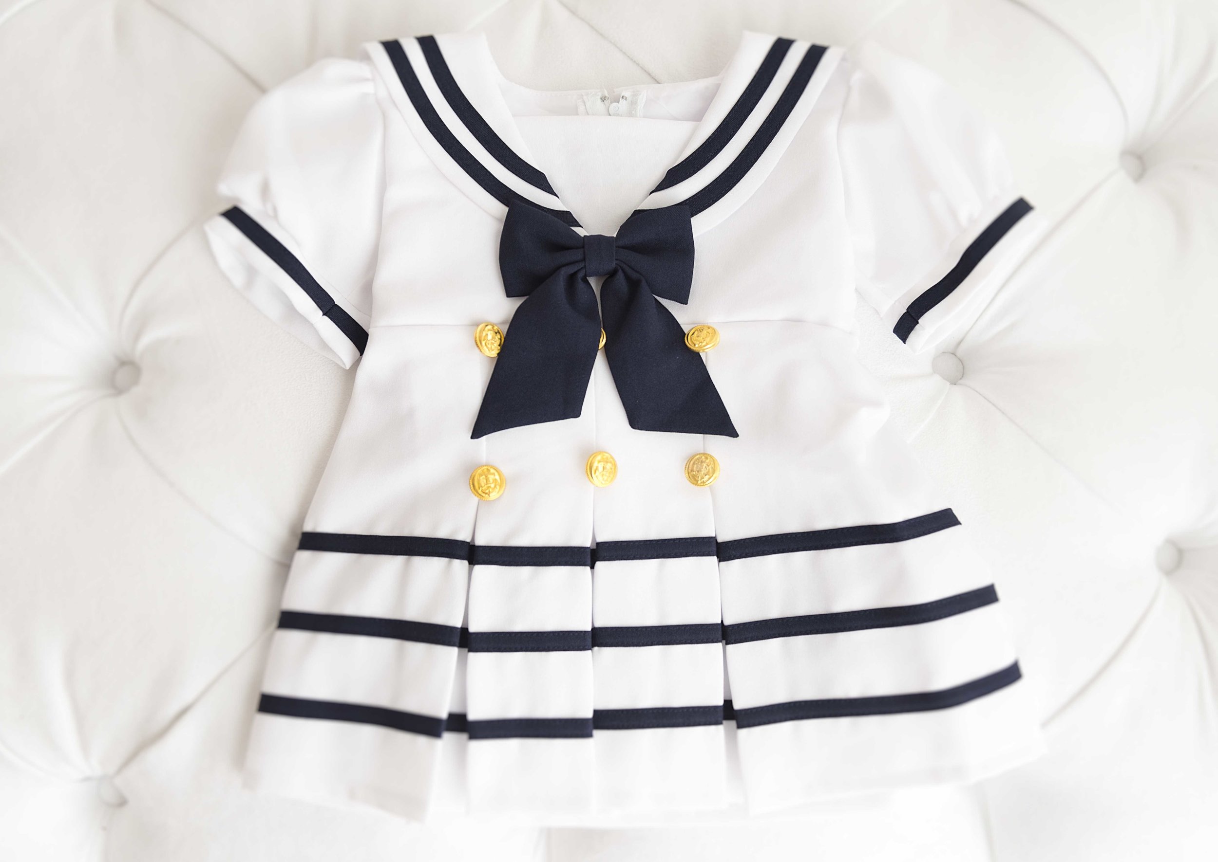  A sweet sailor outfit for your little girl because her first year will sail by so fast.&nbsp; 