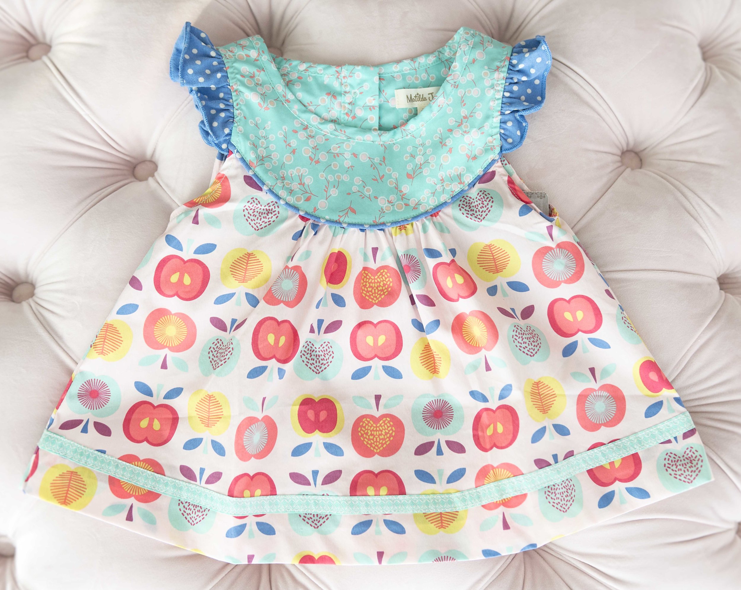  We have several darling Matilda Jane Clothing dresses in our studio for your use including this precious apple print dress. 