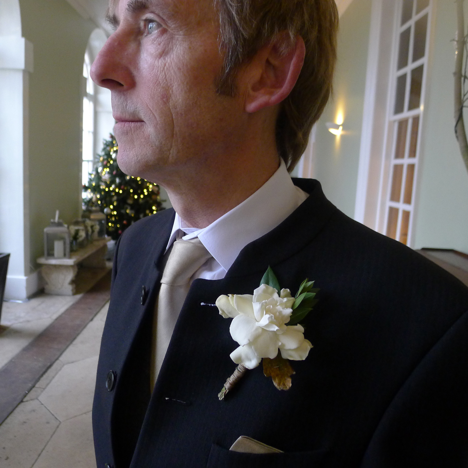 buttonhole with gardenia, myrtle, rosemary and an oak leaf