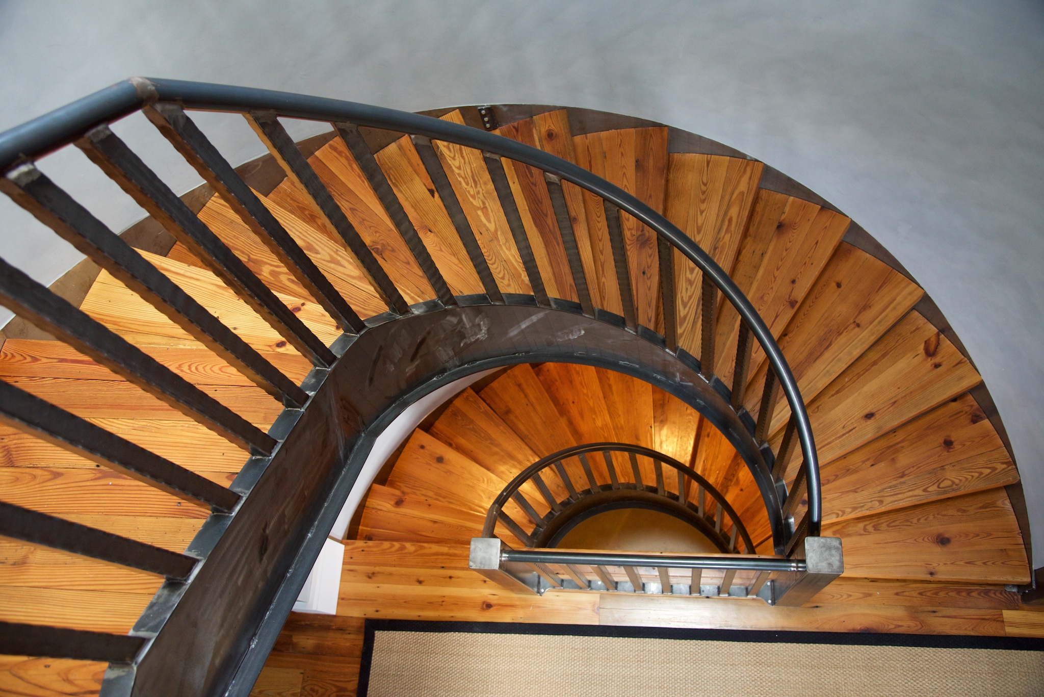 Highlighting architectural features like curved staircase