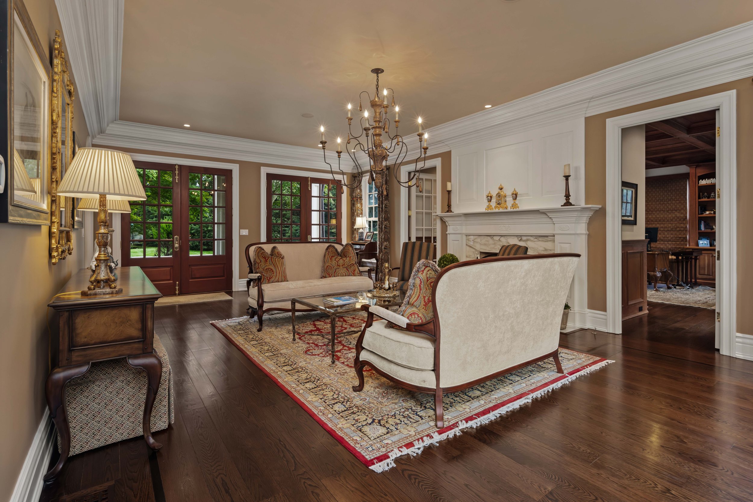 Living room with french doors at 5 Boxwood Ln, Westport, CT 06880-111.jpg