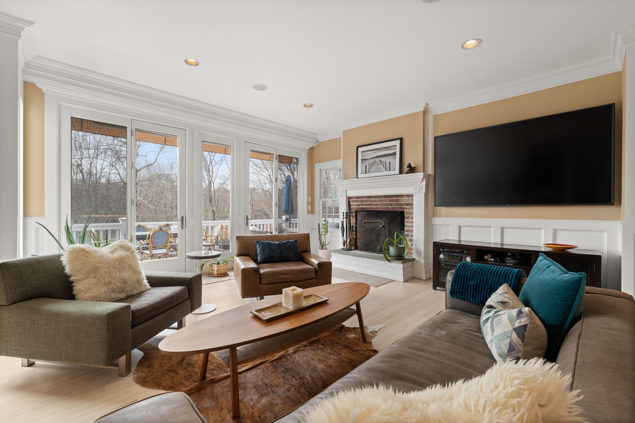 Family room with fireplace at 35BranchBrookRoad-Wilton-CT-06897-SMALL.jpg