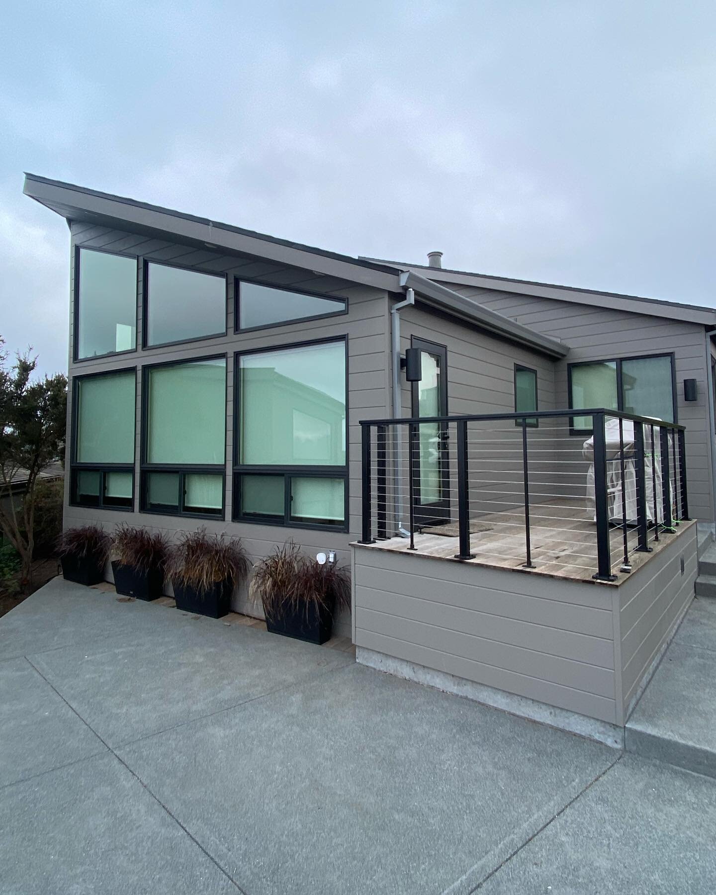 A few shots of our recently completed remodel in Bodega Harbor. This project consisted of new siding, windows and doors, roof, a small addition for a 3rd bathroom and new interior finishes throughout. The last photo is a before shot.