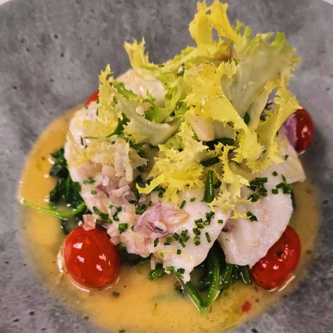 Our Slow Cooked Halibut. Wilted spinach, cherry tomato confit vinaigrette, fris&eacute;e. Practically perfect. We&rsquo;ll see you soon!