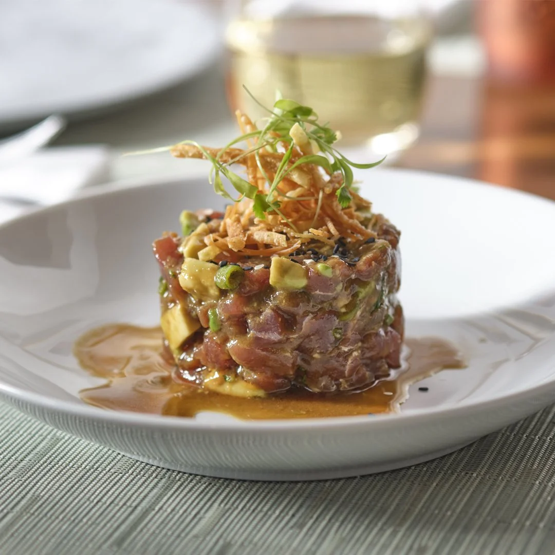 Our Tuna Tartare Nikkei draws from Japanese and Peruvian traditions, with aji amarillo bringing warmth, supported by avocado, sesame, and crisp wontons.A savory blend of Japanese and Peruvian influences. 

#tunatartare #rawbar #thehillcloster