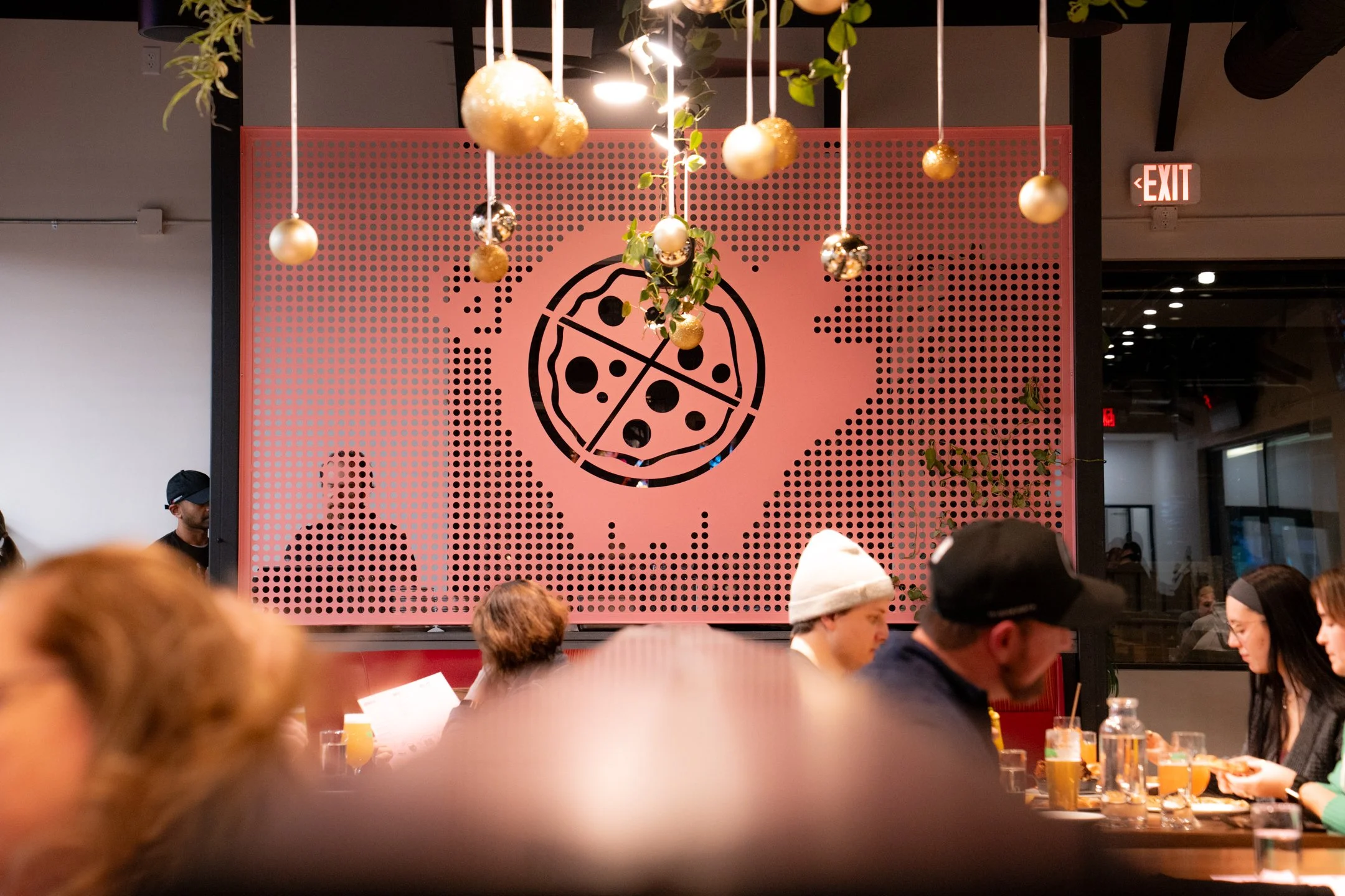 Guests dining at Pig Ate My Pizza Bloomington