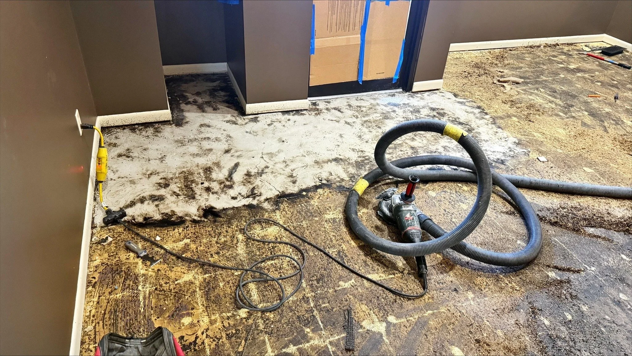 From preparation to completion.

This project included removal of existing flooring at the entry, mechanical adhesive removal, and surface preparation to receive new flooring. Shaw Contract Solitude LVT was then installed and tied into the adjacent c