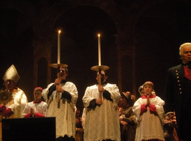 PROCESSIONAL CANDLES: Tosca: adapted Rosco flickers, tubes, gold chargers