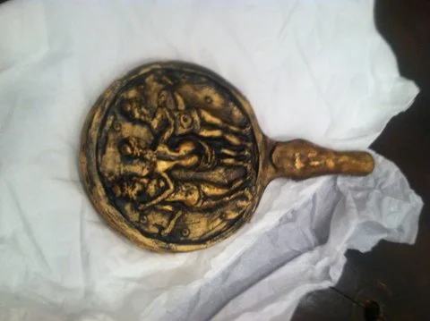 UNBREAKABALE SILICONE MIRROR: Thrown nightly against the wall in         Handel's opera The Triumph of Time: craft foam, silicone