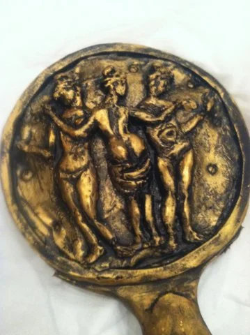 UNBREAKABALE SILICONE MIRROR: Thrown nightly against the wall in         Handel's opera The Triumph of Time: craft foam, silicone