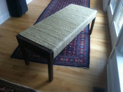 ONE OF A PAIR OF TABLES: Pericles: wood, fabric, rope.