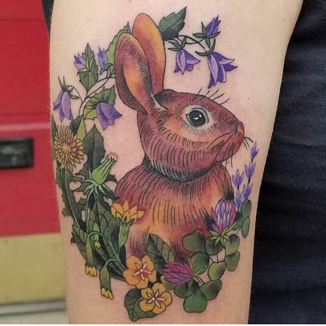 A cute rabbit hanging out in a meadow.🌿 🐰 🌙 Tattoo by @dorothytattoo!
.
.
.
#rabbittattoo #bunnytattoo #meadowflowers #meadowplants #botanicaltattoo #floraltattoo