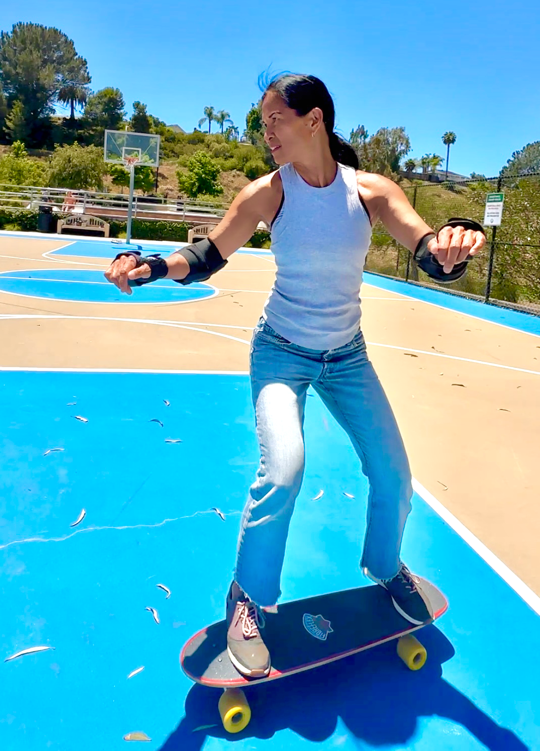 Cristy Hunter skateboarding outdoors