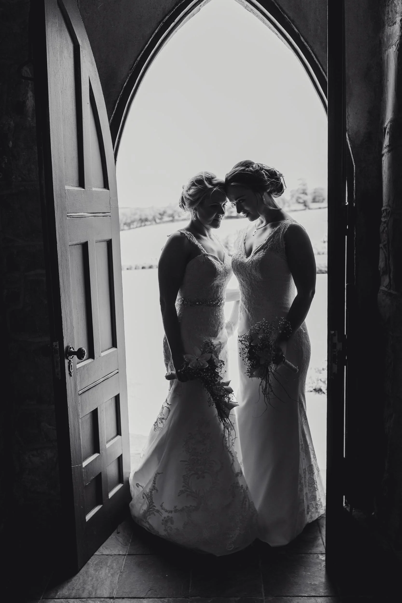 couple holding each other after their wedding ceremony in glenlo abbey galway