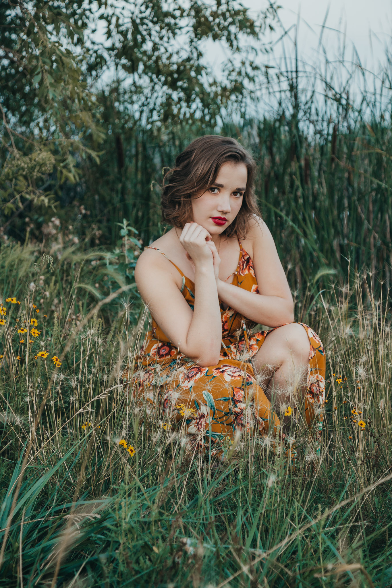 senior girl in flower field