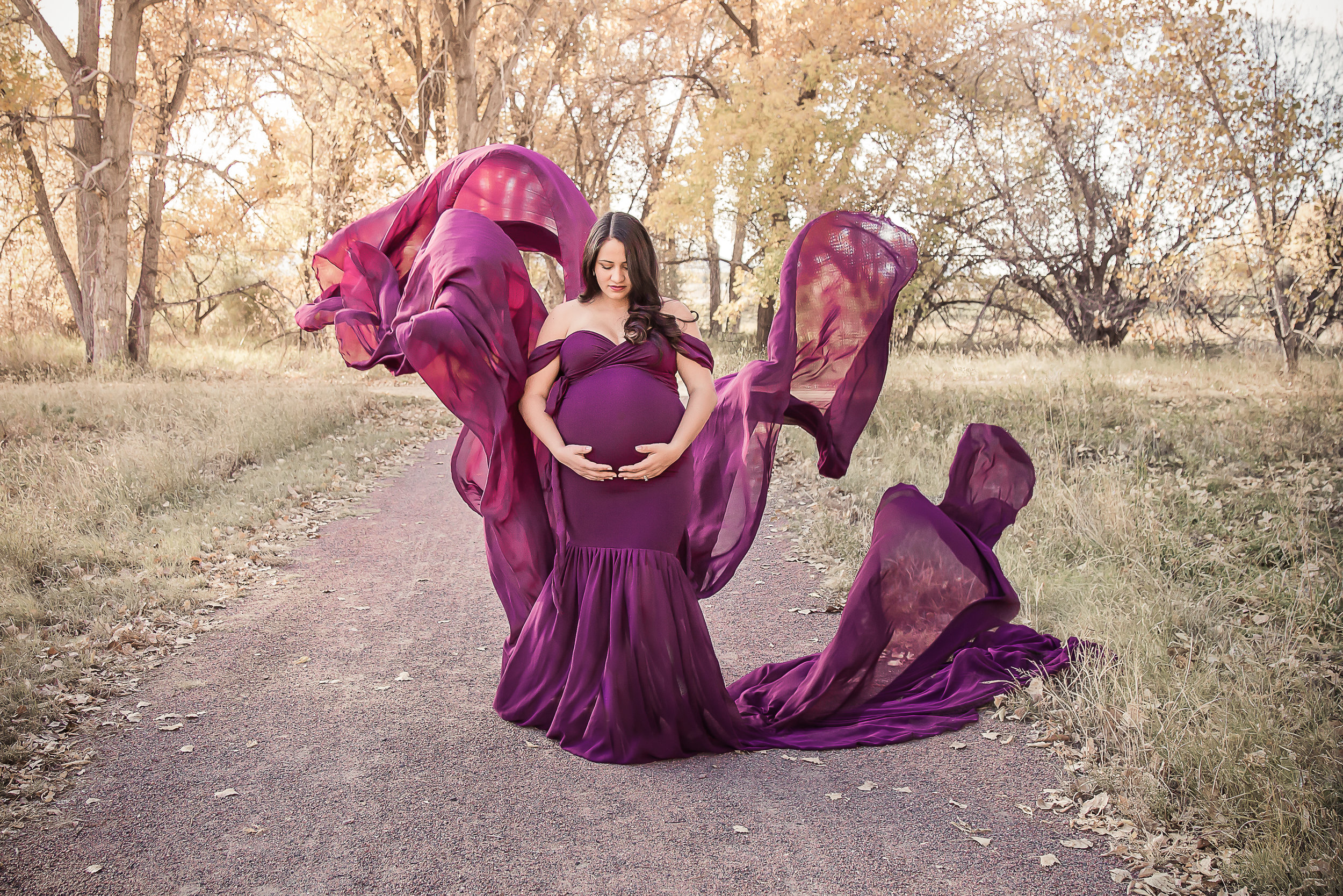 flowing maternity gown in the fall