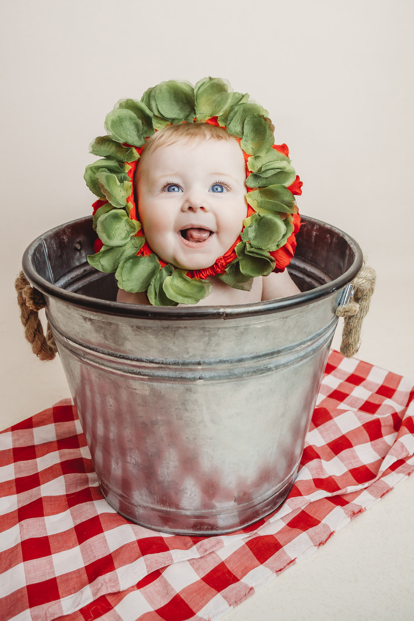 strawberry baby in bucket