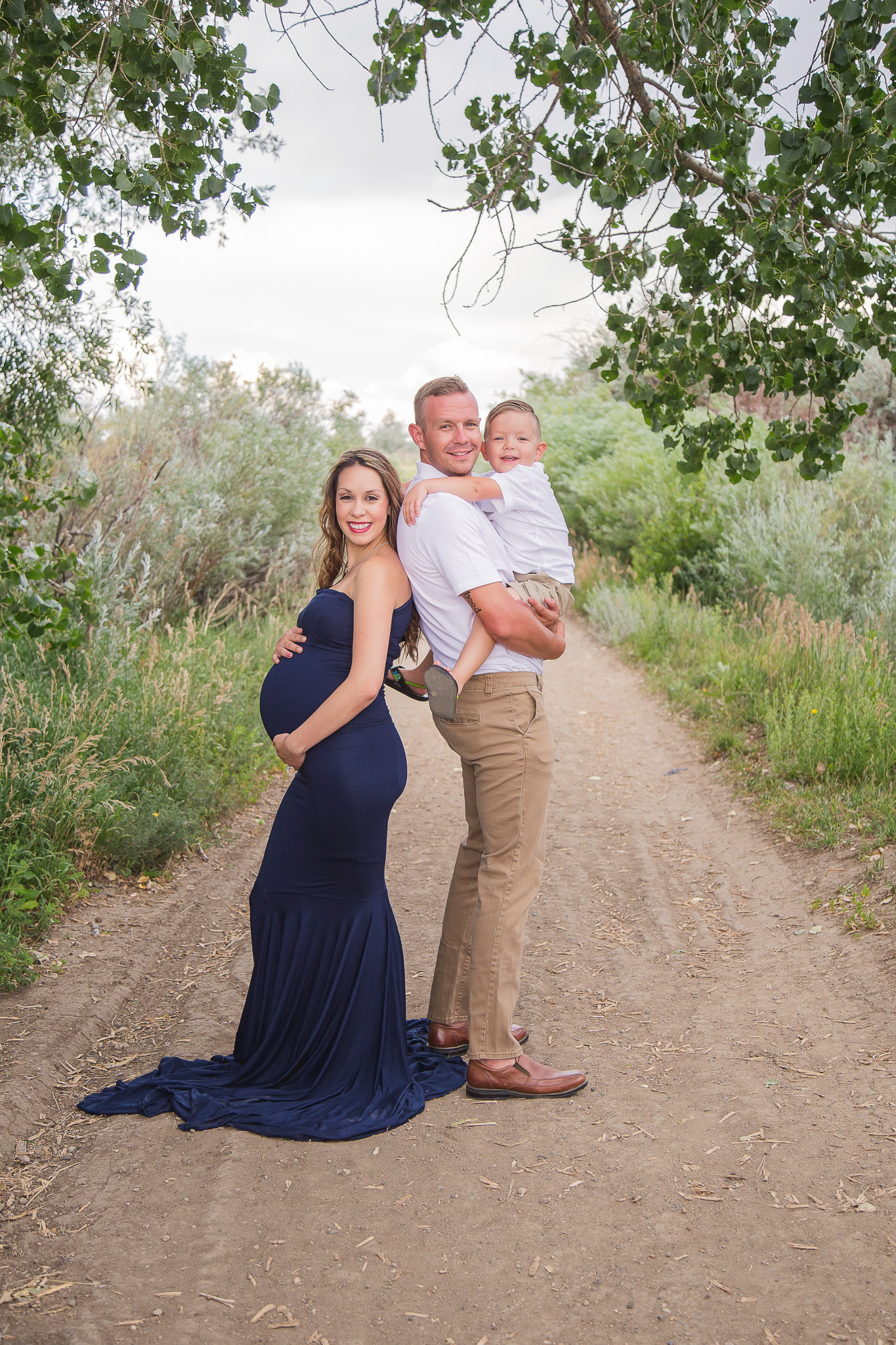 Maternity-Family-with-Toddler-Outside-Gown.jpg