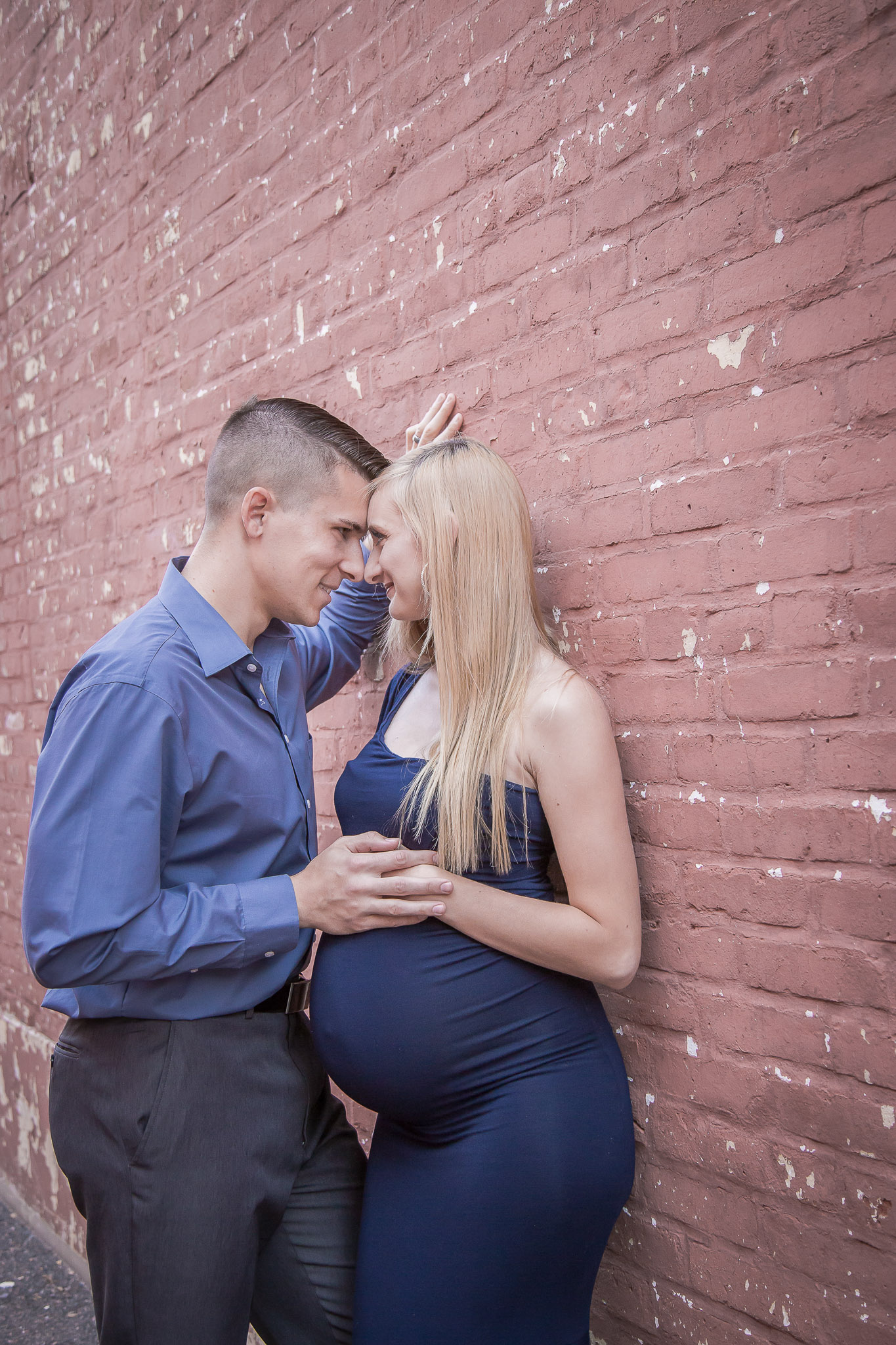 Romantic-Maternity-agains-Brick-Wall-Blue-Gown.jpg