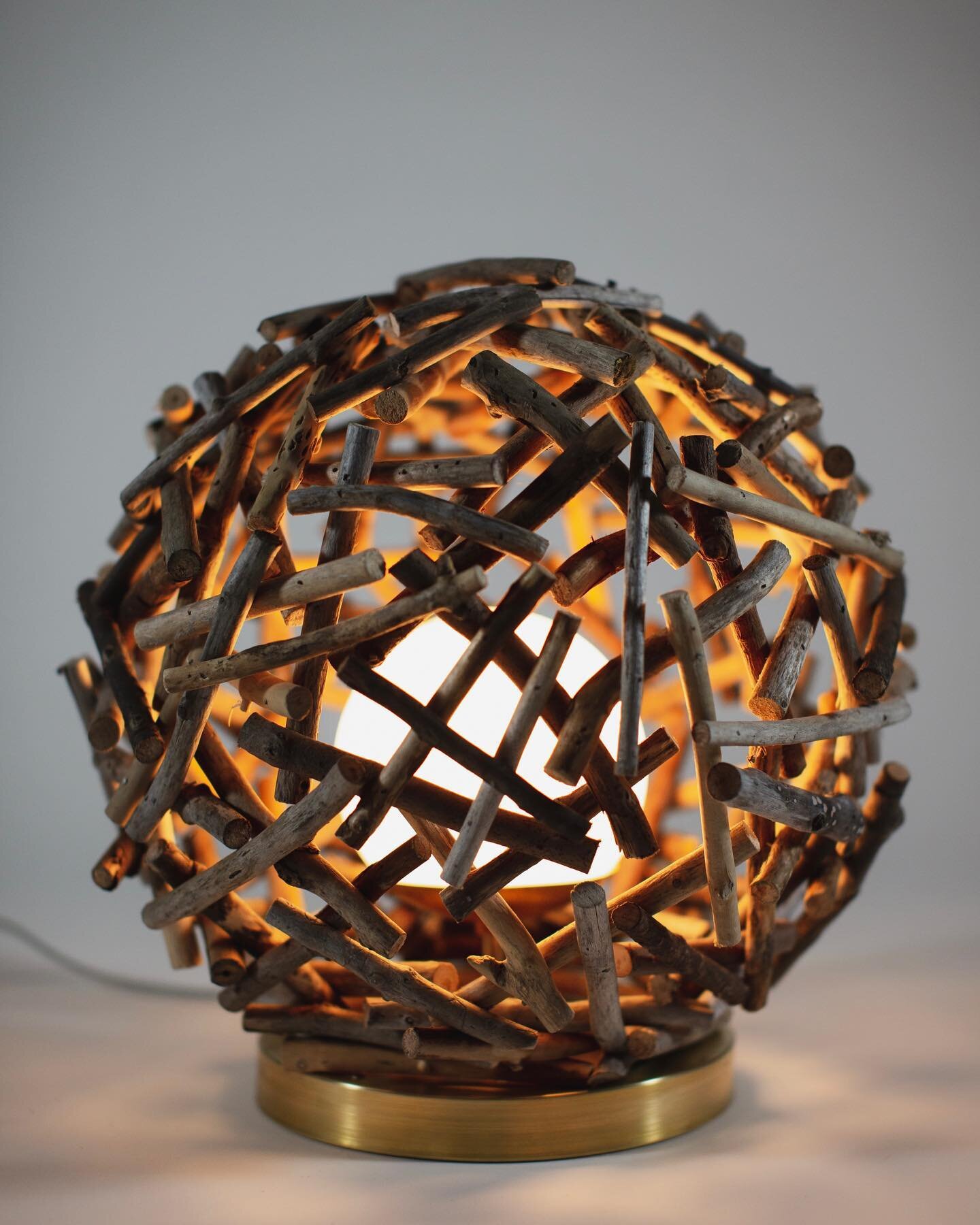 Haystack. A table lamp made from found wood, brass, glass and LED. 12&rdquo; dia. 
-
This one has been with me from the start. I called it my orb light for about 2 years and it has gone through many various iterations. This is the updated version usi