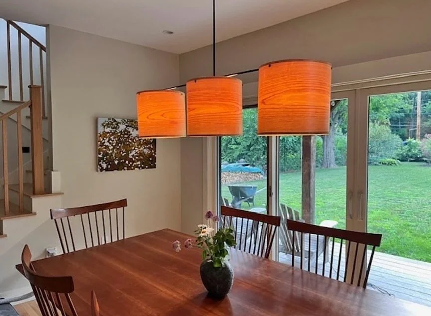 Love seeing a new chandelier design installed in this beautiful home! Three veneer shades with antiqued brass hardware. #lighting