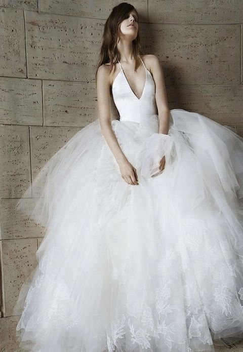 a-ballerina-inspired-look-with-a-sleek-fitting-bodice-on-spaghetti-straps-and-with-a-deep-cut-plus-a-crazy-lace-full-skirt.jpeg