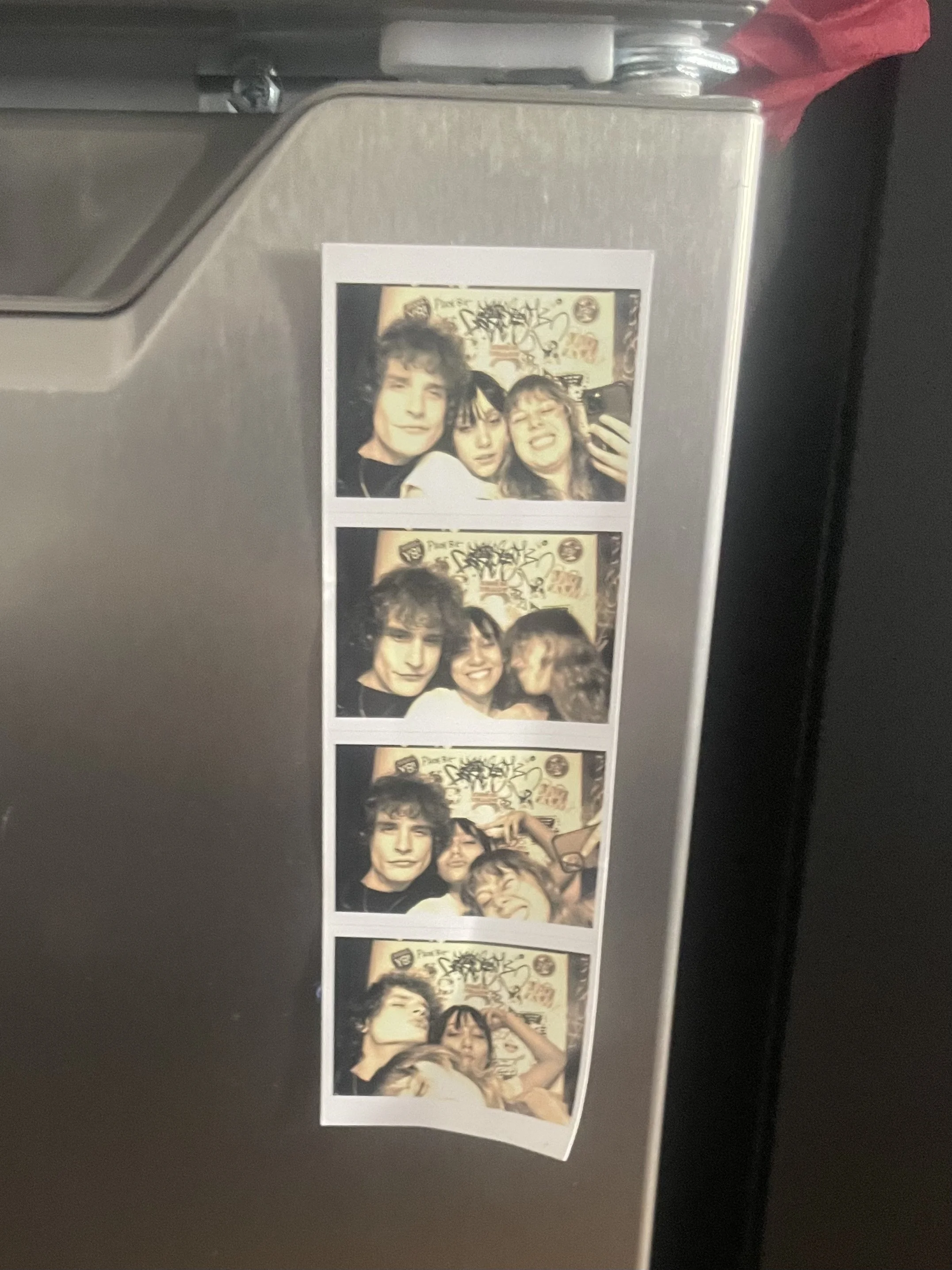  Alexa, Australian guy, and me photobooth print on my fridge 