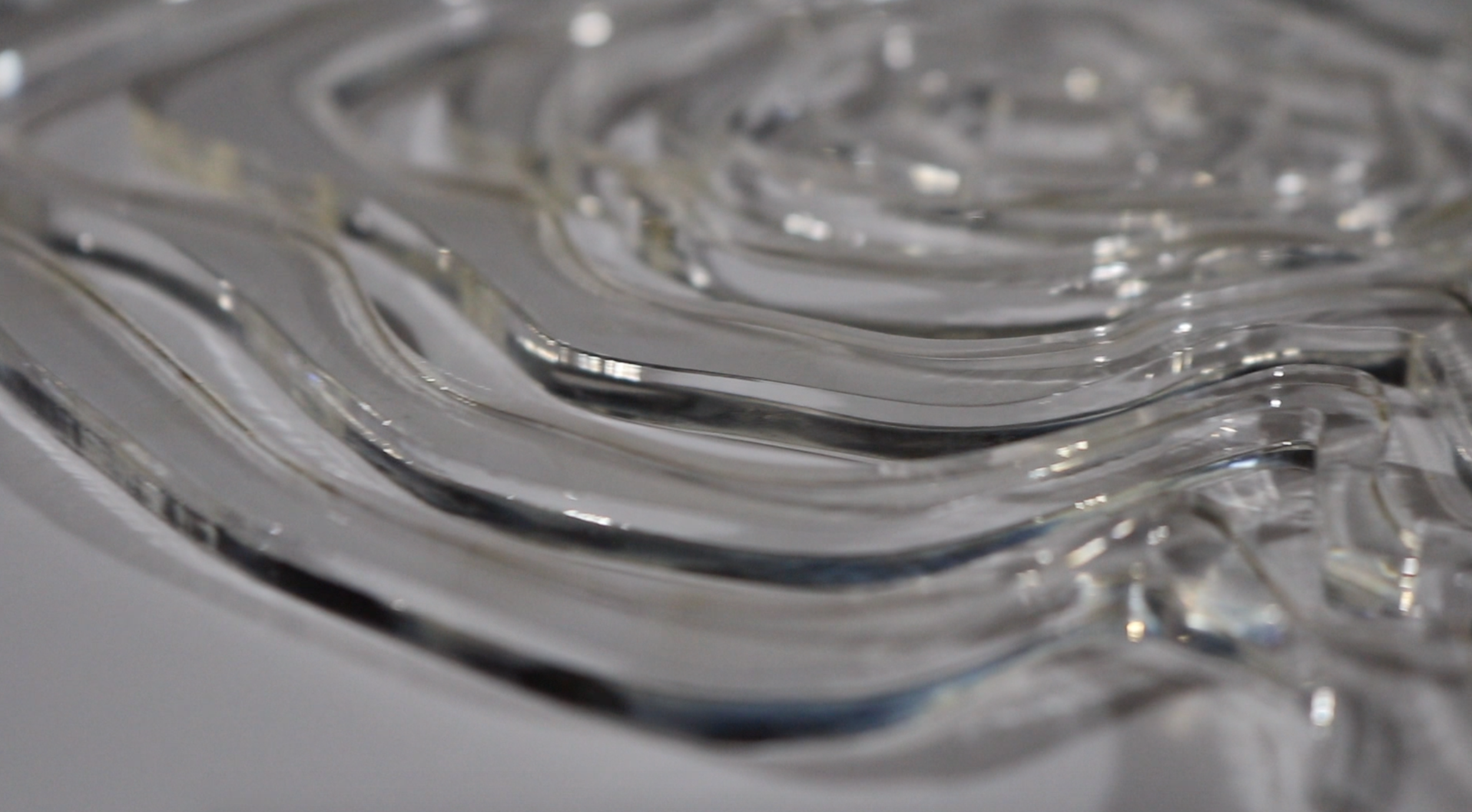 Laser-cut plexiglass before any paint was applied to the surface.