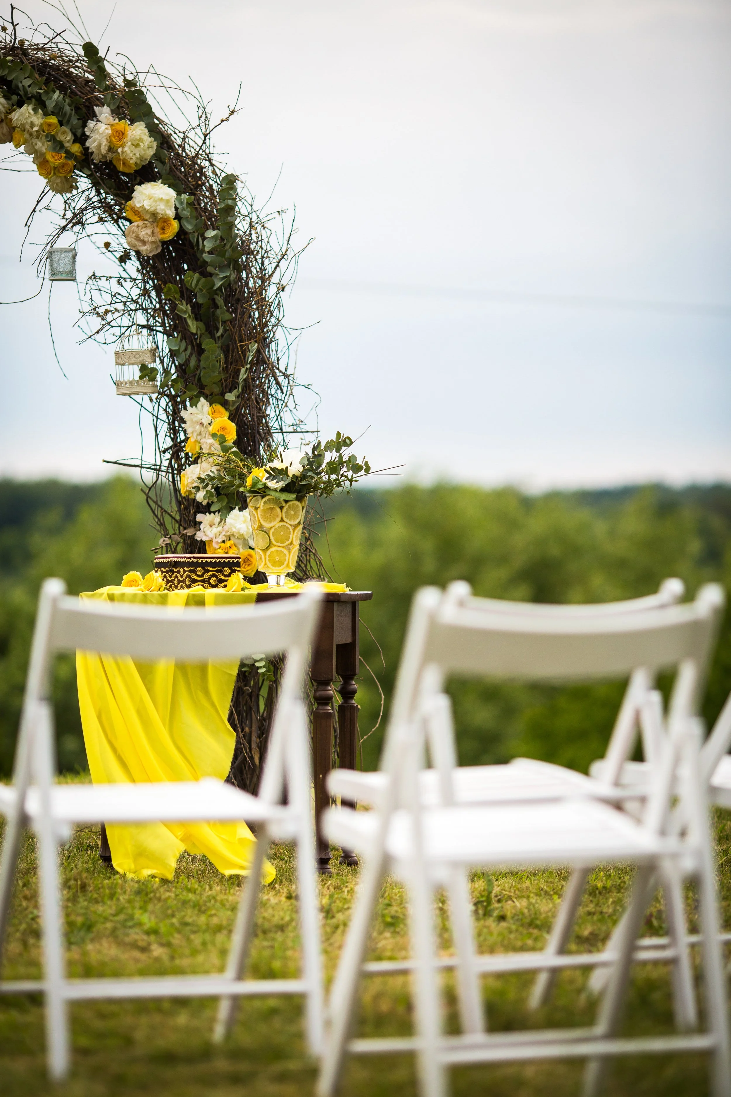 white-garden-chairs-stand-before-wedding-altar-made-osier.jpg
