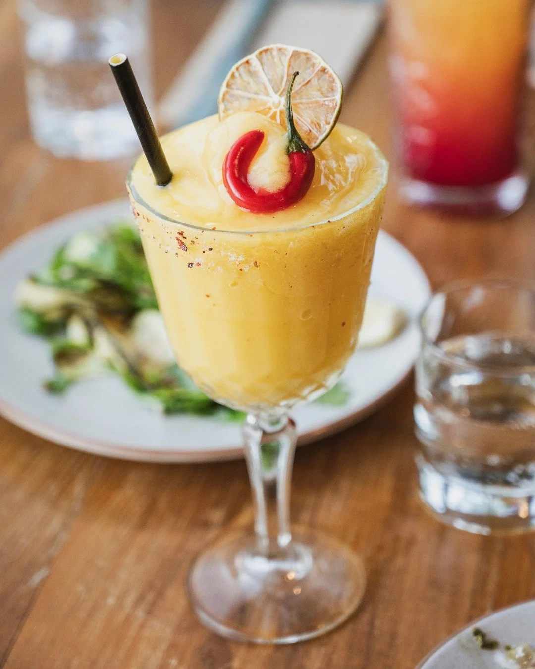 One of our most popular cocktails, our Spicy Mango Margie! 

Sweet, zesty, with a cheeky kick of chili &amp; salt. Have you tried it yet, or are you still playing it safe? ;)