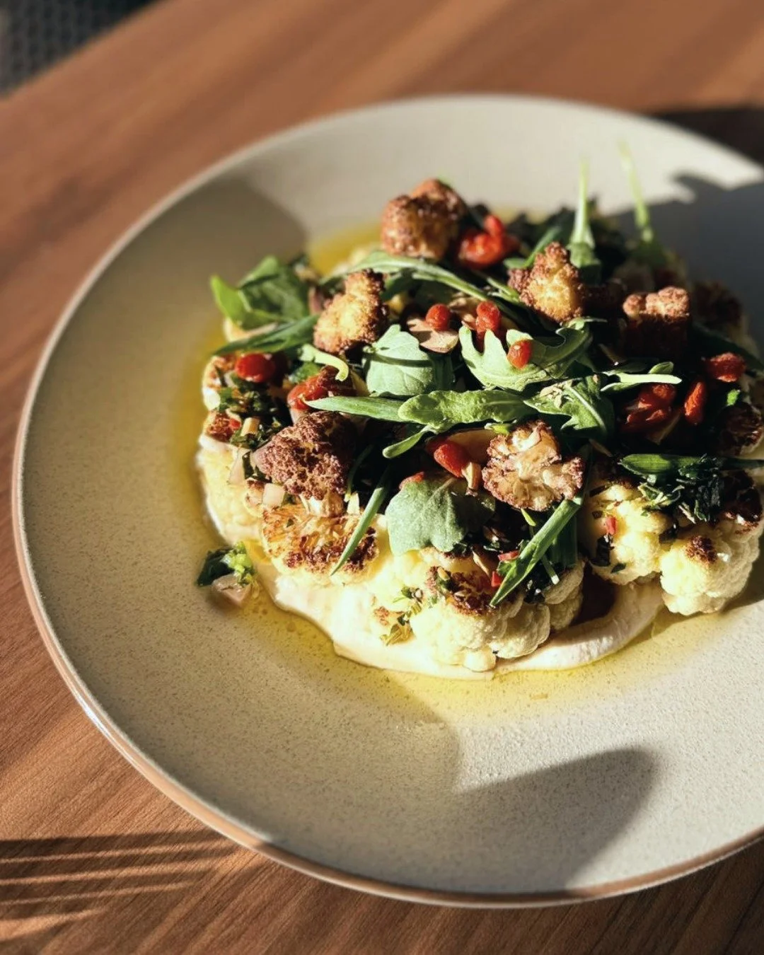 Our roasted cauliflower steak 

This one&rsquo;s for when you want something wholesome but still full of flavour.

Golden roasted cauliflower, creamy chickpea pur&eacute;e, fresh chimichurri, toasted almonds, sweet little pops of goji berries and a h