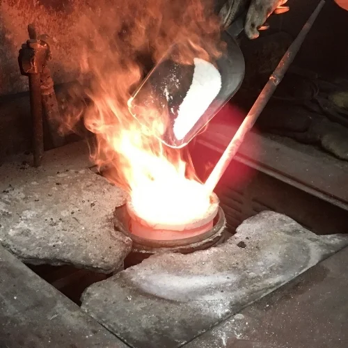 The principle of induction melting is that a high voltage electrical source from a primary coil induces a low voltage, high current in the metal, or secondary coil. Induction heating is simply a method of transferring heat energy.